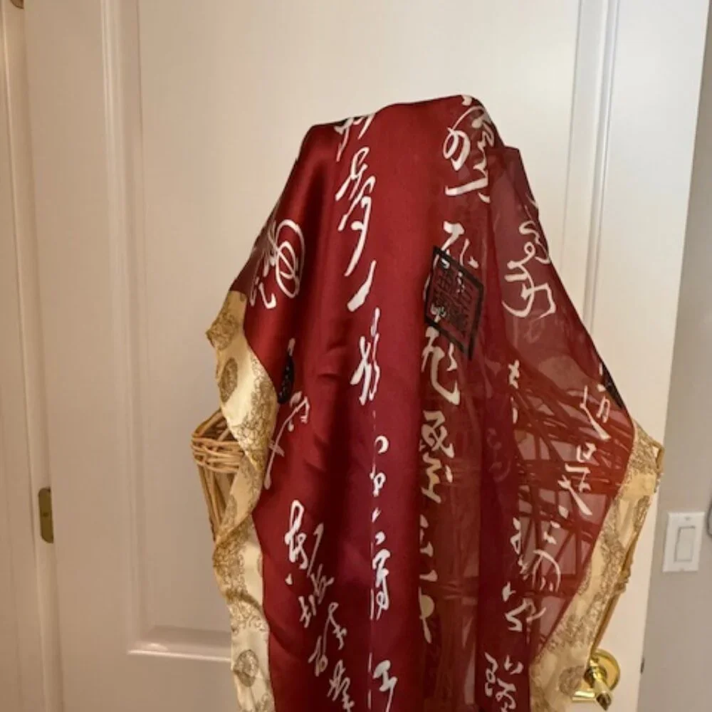Vintage 100% silk rust and gold oblong scarf.